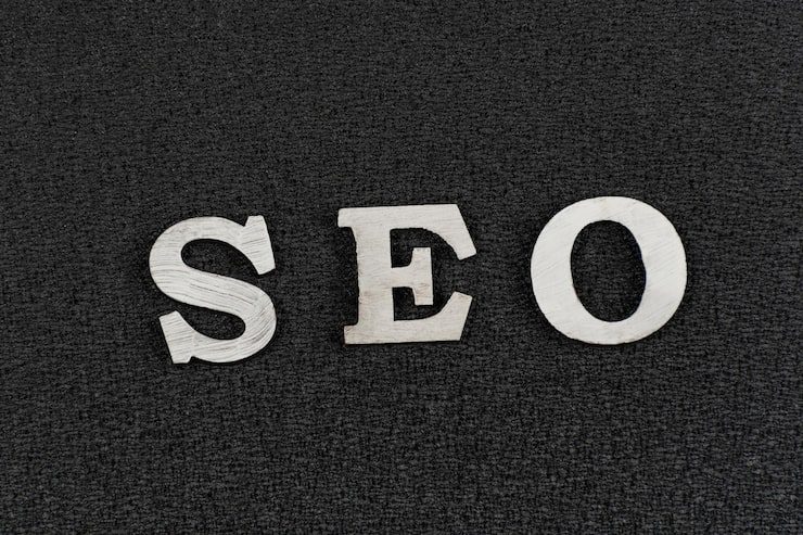 word seo from white wooden letters black background search engine